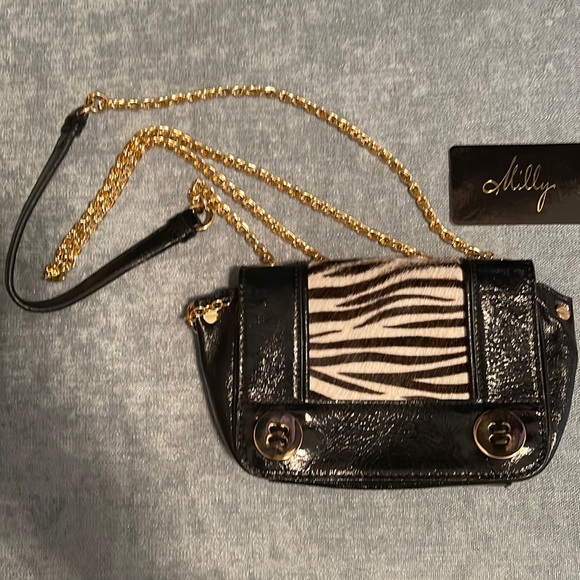 Milly Handbags - Authentic Milly black patent leather crossbody w zebra trim